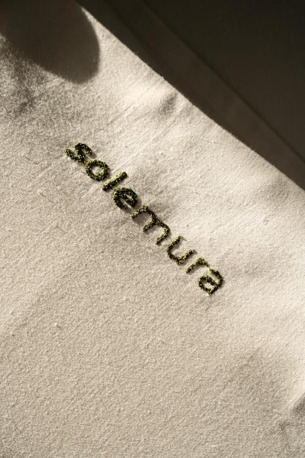 A towel with the solemura embroidery